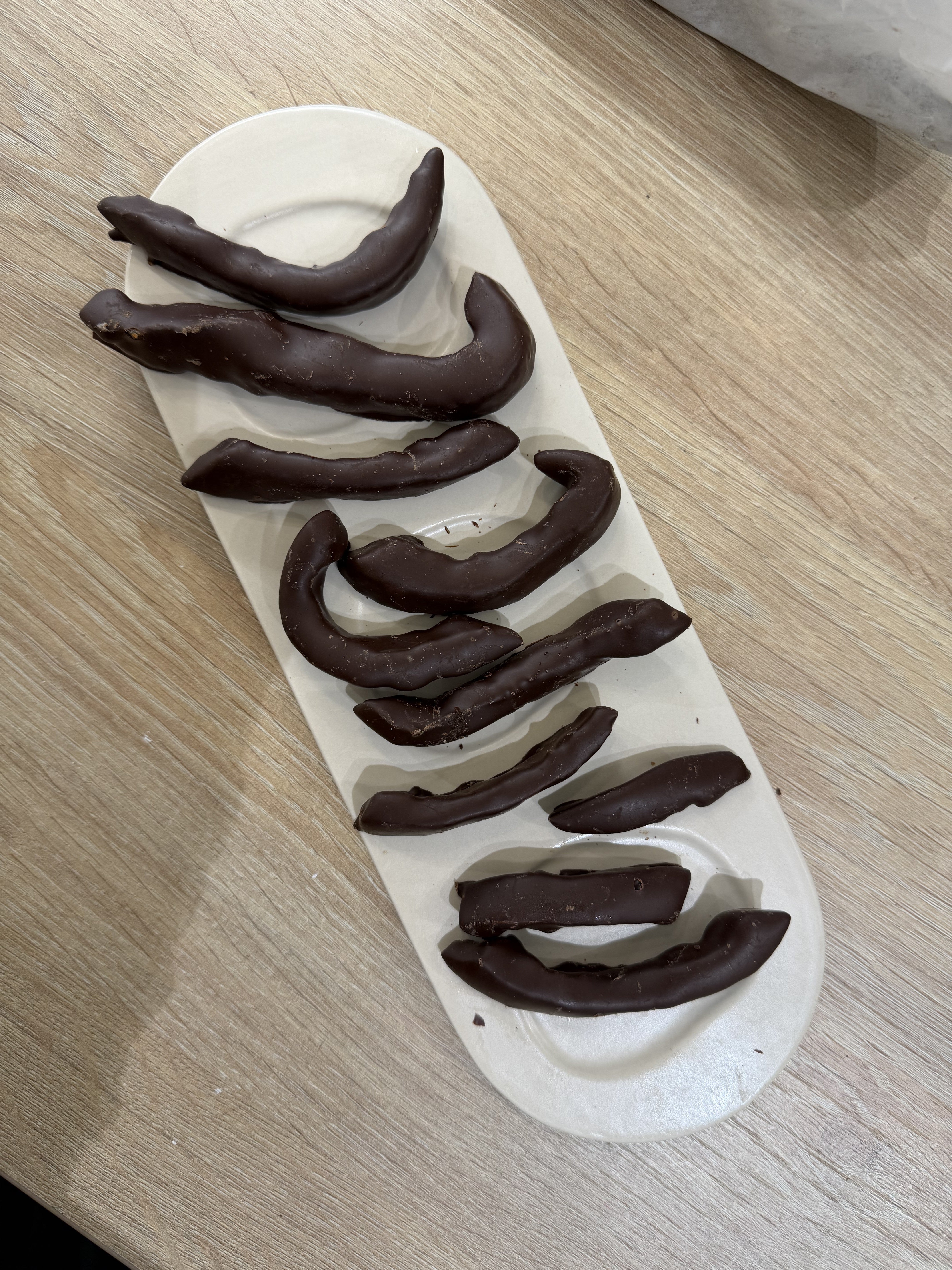 Orange finger biscuit in chocolate